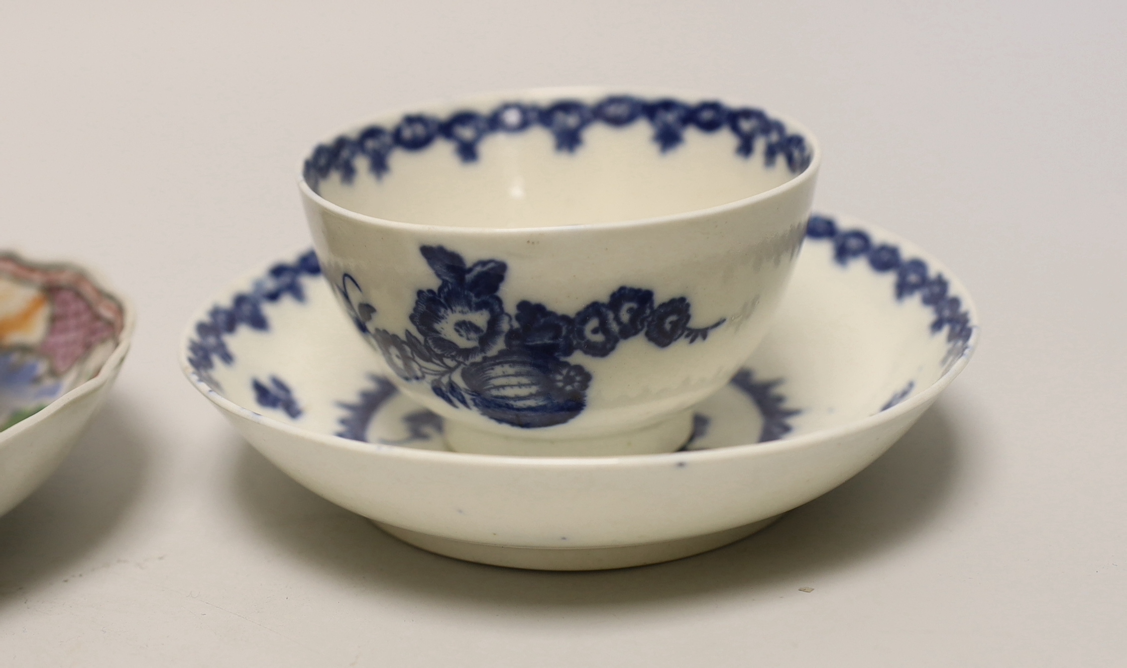 Three 18th century Chinese famille rose tea bowls and matching saucers, a Caughley teabowl and saucer and a single tea bowl and smaller tea bowl